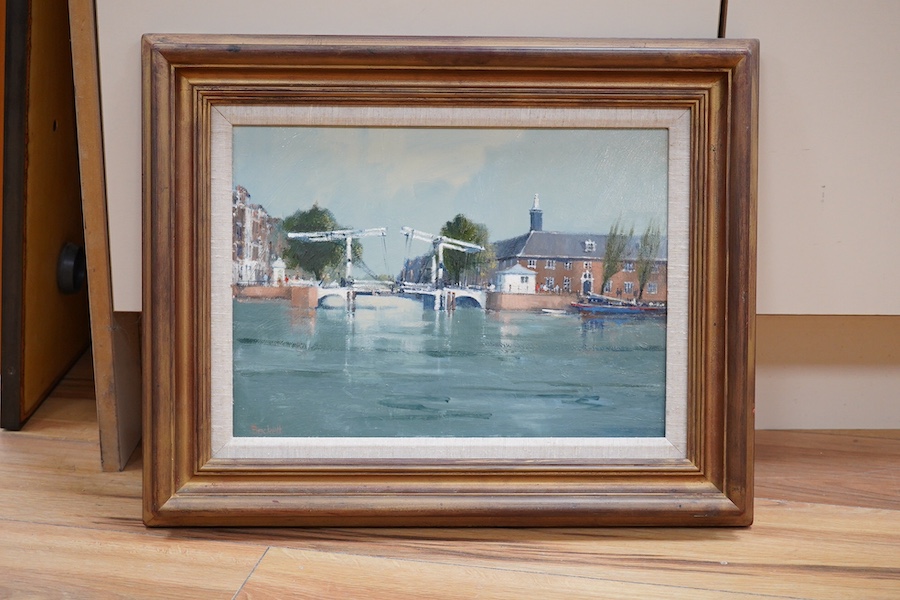 Fred Beckett (20th. C), oil on board, ‘A bridge in Amsterdam’, signed, label verso, 25 x 34cm, gilt frame. Condition - good